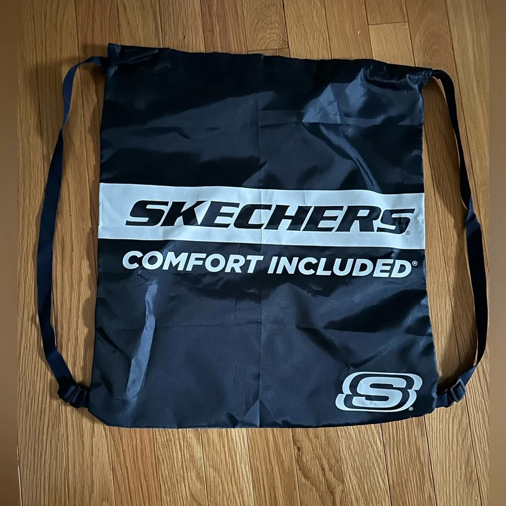 Sketchers navy nylon backpack with straps and hook that anyone can use.